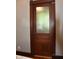 A dark wood door leads to the laundry room at 189 S Jefferson St, Martinsville, IN 46151
