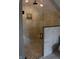 Glass-enclosed marble shower featuring a bench and stylish river rock floor at 189 S Jefferson St, Martinsville, IN 46151