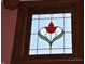 Leaded glass window with flower design at 189 S Jefferson St, Martinsville, IN 46151