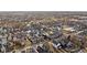 High aerial shot of neighborhood featuring single Gathering homes in early spring at 2031 Central Ave, Indianapolis, IN 46202