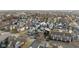 High aerial shot of neighborhood featuring single Gathering homes in early spring at 2031 Central Ave, Indianapolis, IN 46202