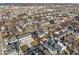 High aerial shot of neighborhood featuring single Gathering homes in early spring at 2031 Central Ave, Indianapolis, IN 46202