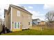 Wide backyard with lush green grass and a newly built deck at 2031 Central Ave, Indianapolis, IN 46202
