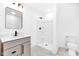 Bright bathroom featuring sleek vanity, walk-in shower, and modern fixtures at 2031 Central Ave, Indianapolis, IN 46202