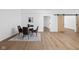 Stylish dining room with modern furniture and a decorative rug on hard surface floors at 2031 Central Ave, Indianapolis, IN 46202