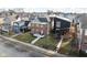 Aerial view of a two-story brick home with landscaped front yard in residential neighborhood at 2031 Central Ave, Indianapolis, IN 46202