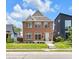 Beautiful brick two-story home with a manicured lawn and classic design at 2031 Central Ave, Indianapolis, IN 46202