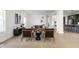 Open-concept living room with modern furniture, light wood floors, and abundant natural light at 2031 Central Ave, Indianapolis, IN 46202