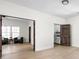 Open living room featuring wooden doors with a glimpse into other rooms at 2031 Central Ave, Indianapolis, IN 46202