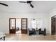 Living room featuring wooden doors that open to reveal other rooms at 2031 Central Ave, Indianapolis, IN 46202
