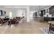 Spacious open-concept living room and kitchen with hardwood floors and modern finishes at 2031 Central Ave, Indianapolis, IN 46202
