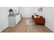 Inviting living room featuring hard surface floors, a comfortable sofa, and natural light at 2031 Central Ave, Indianapolis, IN 46202
