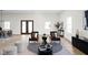 Inviting living room with stylish seating, decor, and access to dining area at 2031 Central Ave, Indianapolis, IN 46202