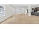 Large living space with light hardwood floors and neutral paint at 2031 Central Ave, Indianapolis, IN 46202
