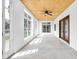 Bright sunroom with large windows, a ceiling fan, and wood ceiling at 2031 Central Ave, Indianapolis, IN 46202