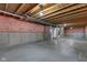 An unfinished basement featuring concrete floor, insulated walls, and utility access at 281 Dovetree Dr, Danville, IN 46122