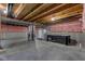 An unfinished basement featuring concrete floor, insulated walls, and utility access at 281 Dovetree Dr, Danville, IN 46122