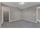 Spacious bedroom with plush carpet and access to two closets at 281 Dovetree Dr, Danville, IN 46122