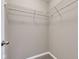 A simple closet features wire shelving and neutral paint at 281 Dovetree Dr, Danville, IN 46122