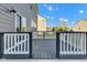 A spacious deck with black and white railings, perfect for enjoying the backyard view at 281 Dovetree Dr, Danville, IN 46122