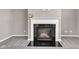 A close-up view of the living room fireplace, showcasing its elegant design and cozy ambiance at 281 Dovetree Dr, Danville, IN 46122