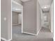 Hallway featuring neutral paint, carpet, recessed lighting, and doorways into other rooms at 281 Dovetree Dr, Danville, IN 46122