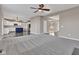 Open-concept living space flowing seamlessly from the living room into the modern kitchen at 281 Dovetree Dr, Danville, IN 46122