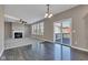 Inviting living room with fireplace and seamless access to the outdoor deck area at 281 Dovetree Dr, Danville, IN 46122