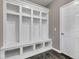 Mudroom with built-in storage, offering a convenient and organized transition space at 281 Dovetree Dr, Danville, IN 46122
