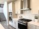 Gourmet kitchen featuring stainless steel appliances, modern cabinetry, and a gas range, perfect for culinary enthusiasts at 3535 Merchmont Rd, Bargersville, IN 46106