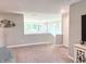 A bonus room offers a versatile living space with ample natural light and contemporary decor at 3535 Merchmont Rd, Bargersville, IN 46106
