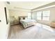 Relaxing main bedroom with tray ceiling, neutral walls, and large windows offering plenty of natural light at 3535 Merchmont Rd, Bargersville, IN 46106