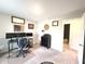 Bright and spacious office with multiple monitors and comfortable furnishings, ideal for productivity at 3535 Merchmont Rd, Bargersville, IN 46106