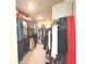 Spacious walk-in closet featuring ample hanging space and shelving for optimal organization at 3535 Merchmont Rd, Bargersville, IN 46106