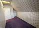 A bedroom with rainbow wallpaper and purple carpet at 367 W Broadway St, Shelbyville, IN 46176