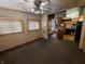 View of the living room, showcasing windows and connected kitchen at 367 W Broadway St, Shelbyville, IN 46176