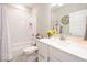 Bright bathroom featuring a shower/tub combination and a white vanity with solid surface countertops at 3865 Kensington Dr, Danville, IN 46122