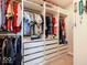 Spacious walk-in closet featuring custom shelving and ample storage space for clothes at 3865 Kensington Dr, Danville, IN 46122