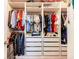 Large walk-in closet with custom shelving, drawers and hanging storage at 3865 Kensington Dr, Danville, IN 46122
