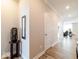 Hallway featuring hardwood floors and neutral walls, leading to other rooms of the home at 3865 Kensington Dr, Danville, IN 46122