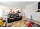 Open concept living room showcasing an eat-in kitchen, modern appliances, and a comfortable seating arrangement at 3865 Kensington Dr, Danville, IN 46122