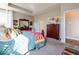 Spacious main bedroom with a bed, sitting area, dresser, and plenty of natural light at 3865 Kensington Dr, Danville, IN 46122