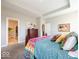 Spacious main bedroom with a bed, sitting area, dresser, and plenty of natural light at 3865 Kensington Dr, Danville, IN 46122