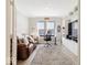 Comfortable office featuring a brown leather couch, desk, and built-in shelving at 3865 Kensington Dr, Danville, IN 46122