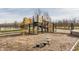 Fun playground area with a slide and various play structures in a safe, wood-chipped setting at 405 Letterman Dr, Brownsburg, IN 46112