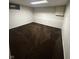 This basement space features finished walls and carpeted flooring, ready to be personalized at 447 S Bradley Ave, Indianapolis, IN 46201