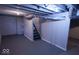 Unfinished basement with painted walls and exposed ceiling, offering a blank canvas for customization at 4504 Winthrop Ave, Indianapolis, IN 46205