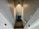 View of steps leading to unfinished basement at 4504 Winthrop Ave, Indianapolis, IN 46205