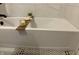 Relaxing bathroom featuring a soaking tub with decorative accessories, marble tiled wall and a rug at 4504 Winthrop Ave, Indianapolis, IN 46205
