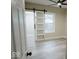 Bedroom with a modern sliding door and neutral paint at 4504 Winthrop Ave, Indianapolis, IN 46205
